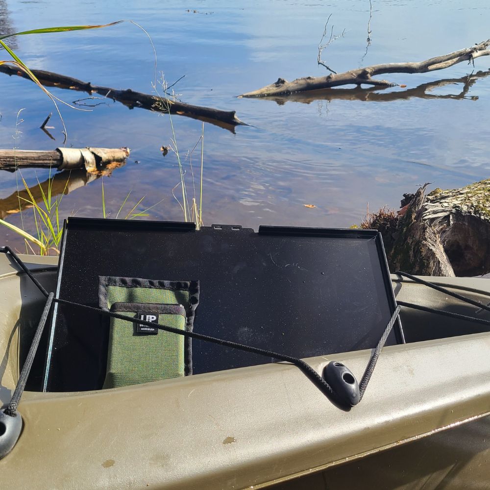 Top Shelf camp and outdoor table being stored in a kayak.